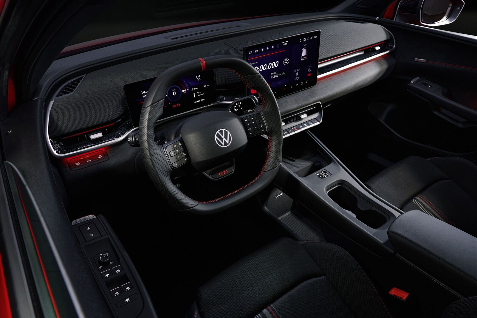 Volkswagen ID. Polo GTI cabin with two digital displays, a GTI steering wheel and red trim.